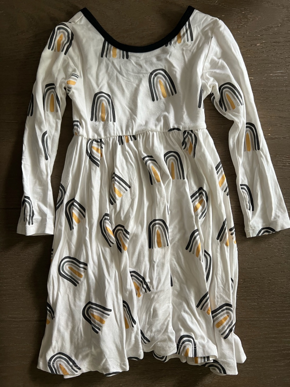 Kyte BABY White Dress with Black and Yellow Rainbow Print